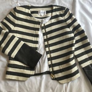 Claudia Pierrot tweed jacket with black leather cuff.